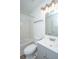 Bathroom featuring shower-tub, neutral floor tile, and vanity with updated light fixture at 5042 Thornton Dr, Summerville, SC 29485