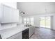 Bright kitchen with gray cabinets, modern appliances, and an open design at 5042 Thornton Dr, Summerville, SC 29485