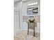 A stylish bathroom features a modern vessel sink, unique wall accents, and a glass shower at 5043 Victoria Ave, North Charleston, SC 29405