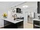 Modern kitchen with a center island, stainless steel appliances, and a bright, clean design at 5043 Victoria Ave, North Charleston, SC 29405