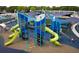 Colorful playground with slides, climbing structures, and shaded areas for children to enjoy outdoor activities at 5043 Victoria Ave, North Charleston, SC 29405