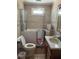 Bathroom featuring a walk-in tub, tile details, and modern fixtures at 505 Blacks St, Walterboro, SC 29488