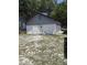 Large detached garage with white doors offering ample storage space at 505 Blacks St, Walterboro, SC 29488