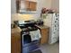 Close-up of updated appliances and cabinet space in kitchen at 505 Blacks St, Walterboro, SC 29488