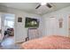 Bedroom features a queen bed, television, and adjacent living room, enhancing relaxation at 510 Shady Maple St, Moncks Corner, SC 29461