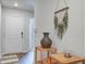 Stylish entryway featuring neutral walls, decor, and a glimpse into the adjacent rooms with hardwood flooring at 510 Shady Maple St, Moncks Corner, SC 29461