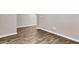 This basement features beautiful wood flooring, clean trim, and neutral walls providing a blank canvas at 5138 Preserve Blvd, Ladson, SC 29456