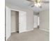Carpeted bedroom with closet and ceiling fan at 5138 Preserve Blvd, Ladson, SC 29456