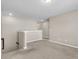 Upstairs hallway with carpet, neutral paint and white trim at 5138 Preserve Blvd, Ladson, SC 29456