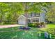 Charming two-story home featuring a manicured lawn, attached garage, and welcoming front porch at 5433 Falling Tide, North Charleston, SC 29420
