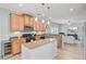 Modern kitchen with stainless steel appliances, granite countertops, and a wine cooler at 5433 Falling Tide, North Charleston, SC 29420