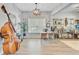 Bright and airy home office with a large window, custom desk, and stylish decor at 5433 Falling Tide, North Charleston, SC 29420