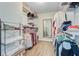 Well-organized walk-in closet with custom shelving and hanging rods at 5433 Falling Tide, North Charleston, SC 29420