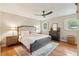 Cozy bedroom with hardwood floors, a ceiling fan, and neutral paint at 614 Beauregard St, Charleston, SC 29412