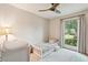 Well-lit room with a large window and neutral walls at 614 Beauregard St, Charleston, SC 29412