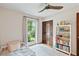 Well-lit room with hardwood floors and a ceiling fan at 614 Beauregard St, Charleston, SC 29412