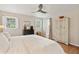 Comfortable bedroom with hardwood floors and a view of the backyard at 614 Beauregard St, Charleston, SC 29412