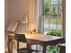 Bright desk space setup with natural light from the large window; creating a perfect workspace at 614 Beauregard St, Charleston, SC 29412