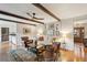Bright living room featuring hardwood floors, neutral walls, and a decorative rug at 614 Beauregard St, Charleston, SC 29412