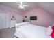 Pink bedroom with desk, white furniture, a white bed frame, and a ceiling fan with overhead lighting at 69 King Charles Cir, Summerville, SC 29485