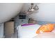 Loft bedroom with slanted ceilings, overhead lighting, and neutral paint featuring an orange throw pillow at 69 King Charles Cir, Summerville, SC 29485