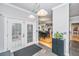 Charming entryway with tiled flooring, double doors and views of the dining area and living room at 69 King Charles Cir, Summerville, SC 29485