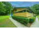Neighborhood pool house with lush green landscaping, fencing and covered porch at 69 King Charles Cir, Summerville, SC 29485