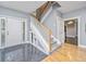 Welcoming foyer with a staircase, tile flooring, and an open view to other rooms in the house at 69 King Charles Cir, Summerville, SC 29485