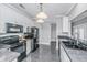 Modern kitchen with black appliances, granite countertops and white cabinets for an updated look at 69 King Charles Cir, Summerville, SC 29485