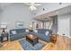 Spacious living room with hardwood flooring, recessed lighting, and large windows for ample natural light at 69 King Charles Cir, Summerville, SC 29485