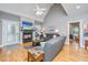 Cozy living room features a fireplace, hardwood floors, ceiling fan and neutral paint colors at 69 King Charles Cir, Summerville, SC 29485