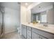 Neutral bathroom featuring a double sink vanity and a glass-enclosed shower, perfect for a modern and serene retreat at 705 Squire Pope Rd, Summerville, SC 29486