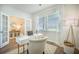 Well-lit office with modern desk, French doors, and stylish decor at 705 Squire Pope Rd, Summerville, SC 29486