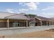Exterior shot of a brick and siding building with a modern roof and well maintained landscaping at 705 Squire Pope Rd, Summerville, SC 29486