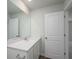 Bathroom featuring a large mirror, vanity with drawers, and a doorway at 737 Meadowbrook Ln, Summerville, SC 29486