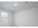 Bedroom with neutral carpet, white walls, and a window, offering a serene and calming space at 737 Meadowbrook Ln, Summerville, SC 29486