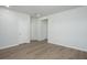 Empty bedroom featuring light hardwood flooring, recessed lighting, and one window overlooking the yard at 737 Meadowbrook Ln, Summerville, SC 29486
