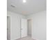 View of bedroom with neutral walls, carpet, overhead lighting, and doorways providing easy access at 737 Meadowbrook Ln, Summerville, SC 29486