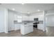 Bright modern kitchen with white cabinetry, stainless steel appliances, and a center island at 737 Meadowbrook Ln, Summerville, SC 29486