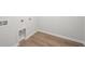 Laundry room with wood-look floors, washer hookups, and convenient placement at 737 Meadowbrook Ln, Summerville, SC 29486