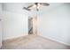 Spacious bedroom with a ceiling fan, neutral walls, and carpet flooring, perfect for relaxation and comfort at 743 Redbud Ln, Summerville, SC 29486