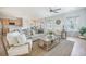 Bright living room with an open layout, kitchen views, and tasteful decor and furnishings at 743 Redbud Ln, Summerville, SC 29486