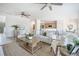 Inviting living room featuring neutral decor, an open layout to the kitchen, and lots of natural light at 743 Redbud Ln, Summerville, SC 29486