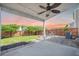 Covered patio with a ceiling fan, a seating area, and a well-maintained fenced backyard at 743 Redbud Ln, Summerville, SC 29486