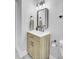 Well-lit bathroom featuring a modern vanity, sleek mirror, and neutral-toned walls with a toilet at 7674 Chippendale Rd, North Charleston, SC 29420