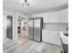 A modern kitchen featuring white cabinetry, stainless steel appliances, and sleek countertops at 7674 Chippendale Rd, North Charleston, SC 29420