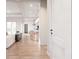 Open-concept design with a view of kitchen and living room with hardwood flooring at 814 Palm Blvd, Isle of Palms, SC 29451