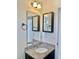 Bathroom featuring vanity with granite countertop and modern fixtures at 9088 Parlor Dr, Ladson, SC 29456