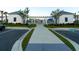 Pool entrance behind a black metal fence with a shaded trellis entrance to either side at 9747 Seed St, Ladson, SC 29456