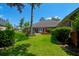 Expansive backyard offering a serene view of the house's exterior and well maintained landscaping at 101 Firestone Ct, Summerville, SC 29483